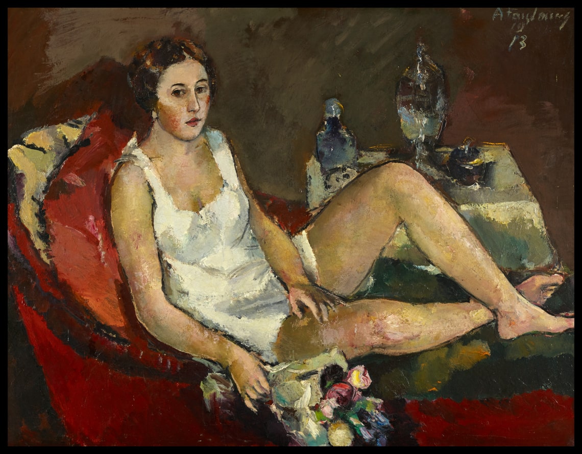 Young woman on a red sofa
