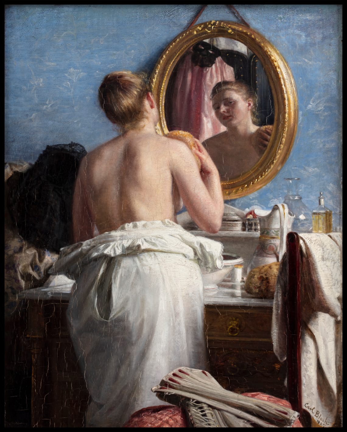 A girl washing herself before a carnival