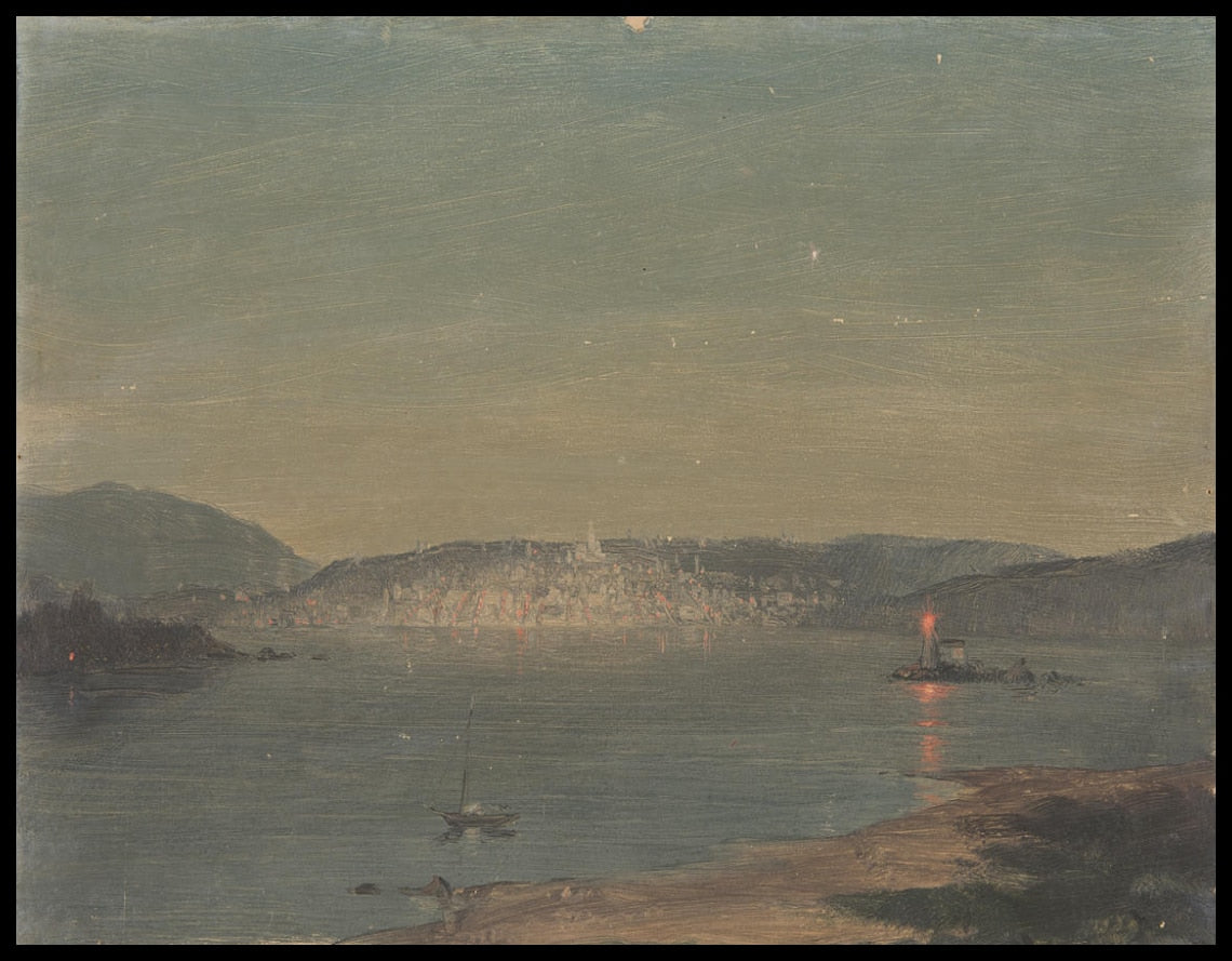Vue nocturne d'une ville maritime