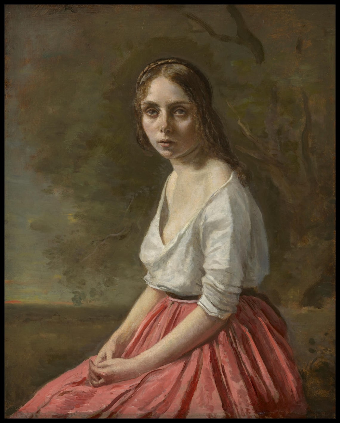 Jeune femme en jupe rose
