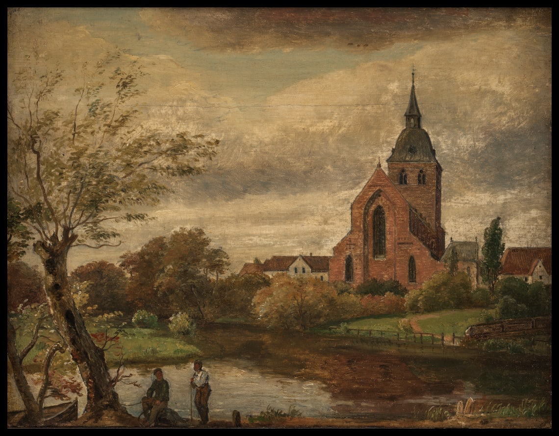 L'église St Knud près de la rivière à Odense. Automne