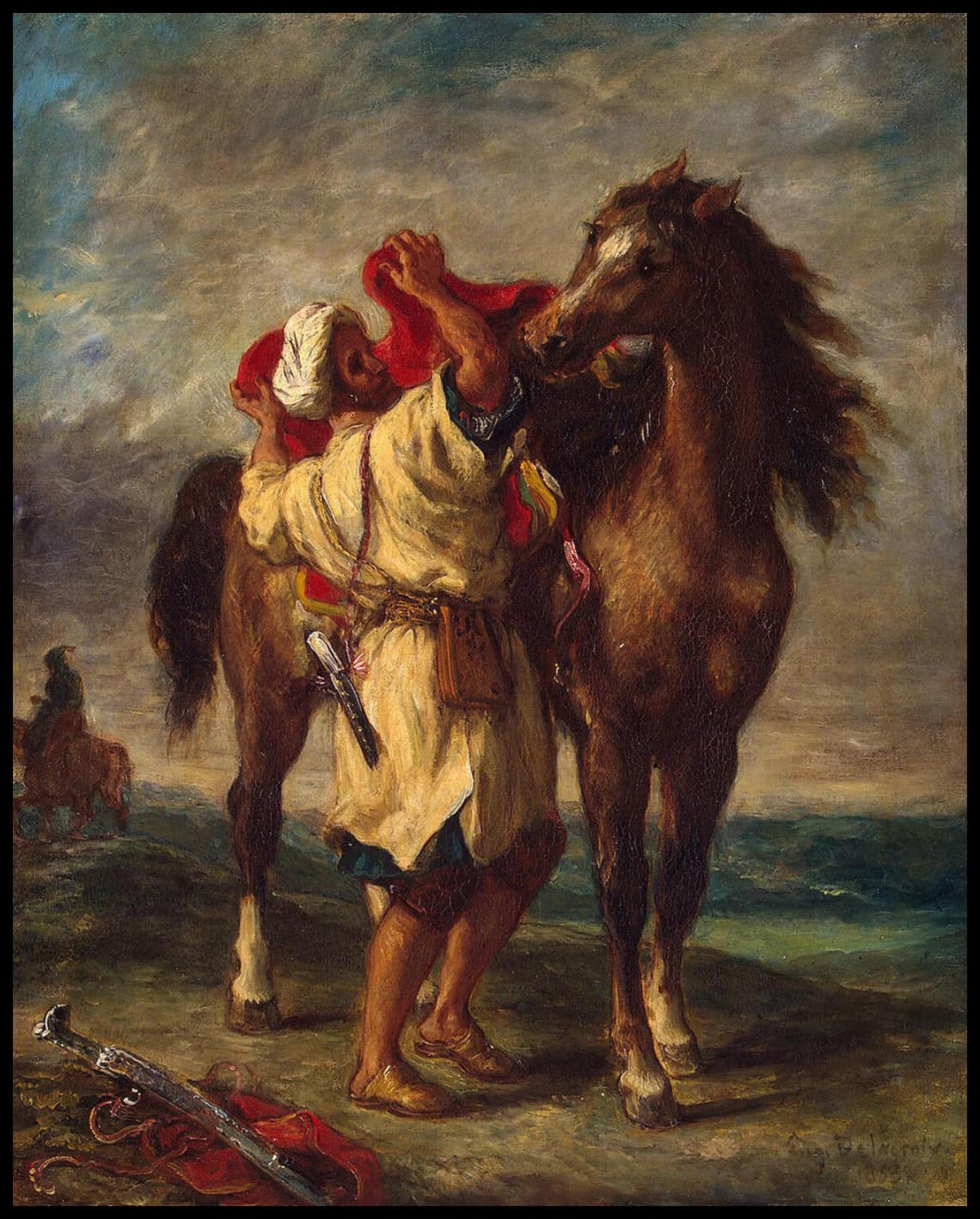 Marocain en train de seller son cheval