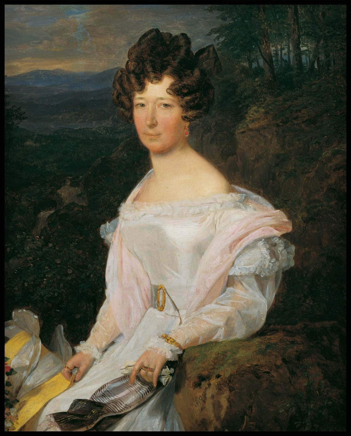 Lady in a white dress in front of a Vienna Woods landscape