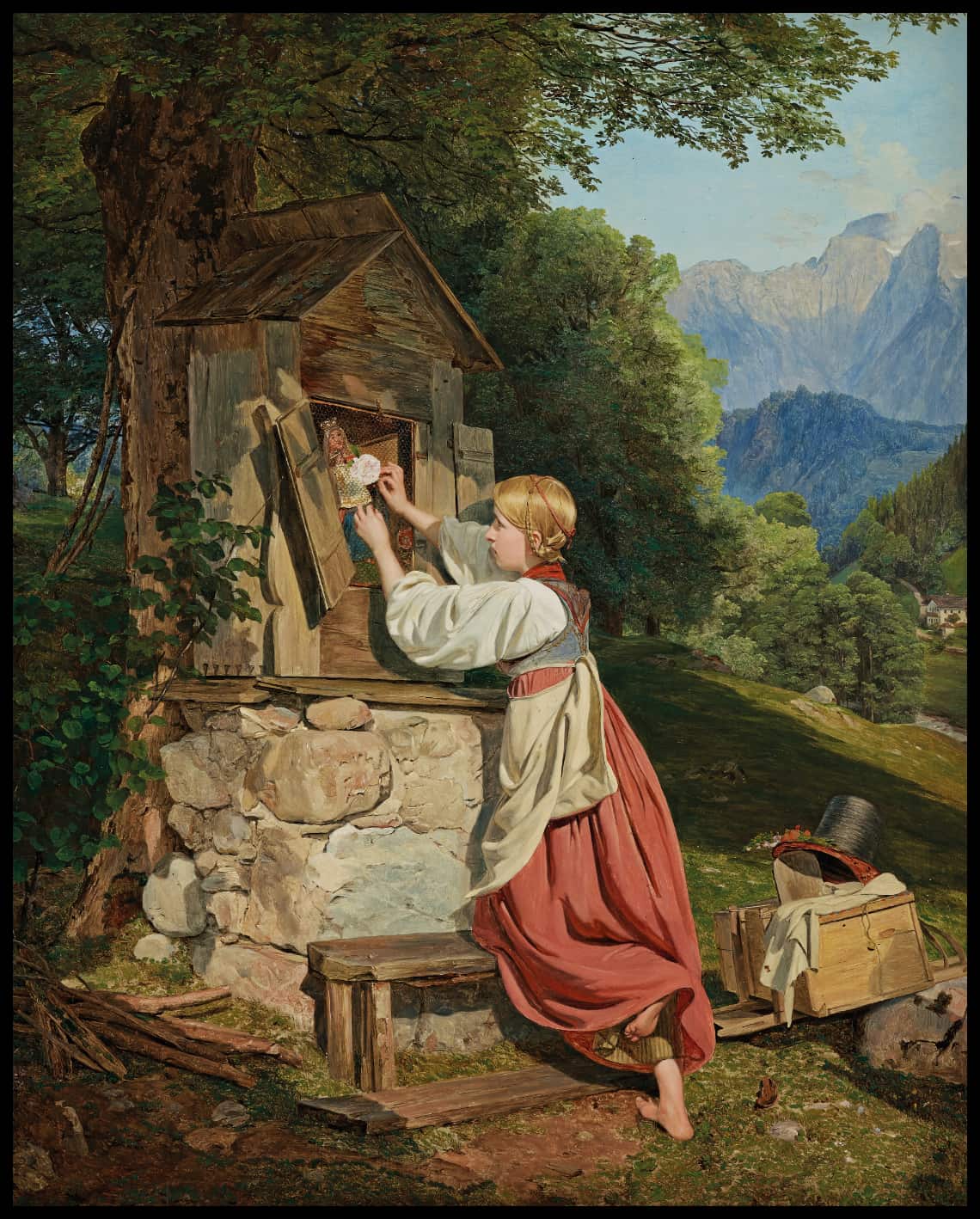 A girl adorns the Mother of God with a rose