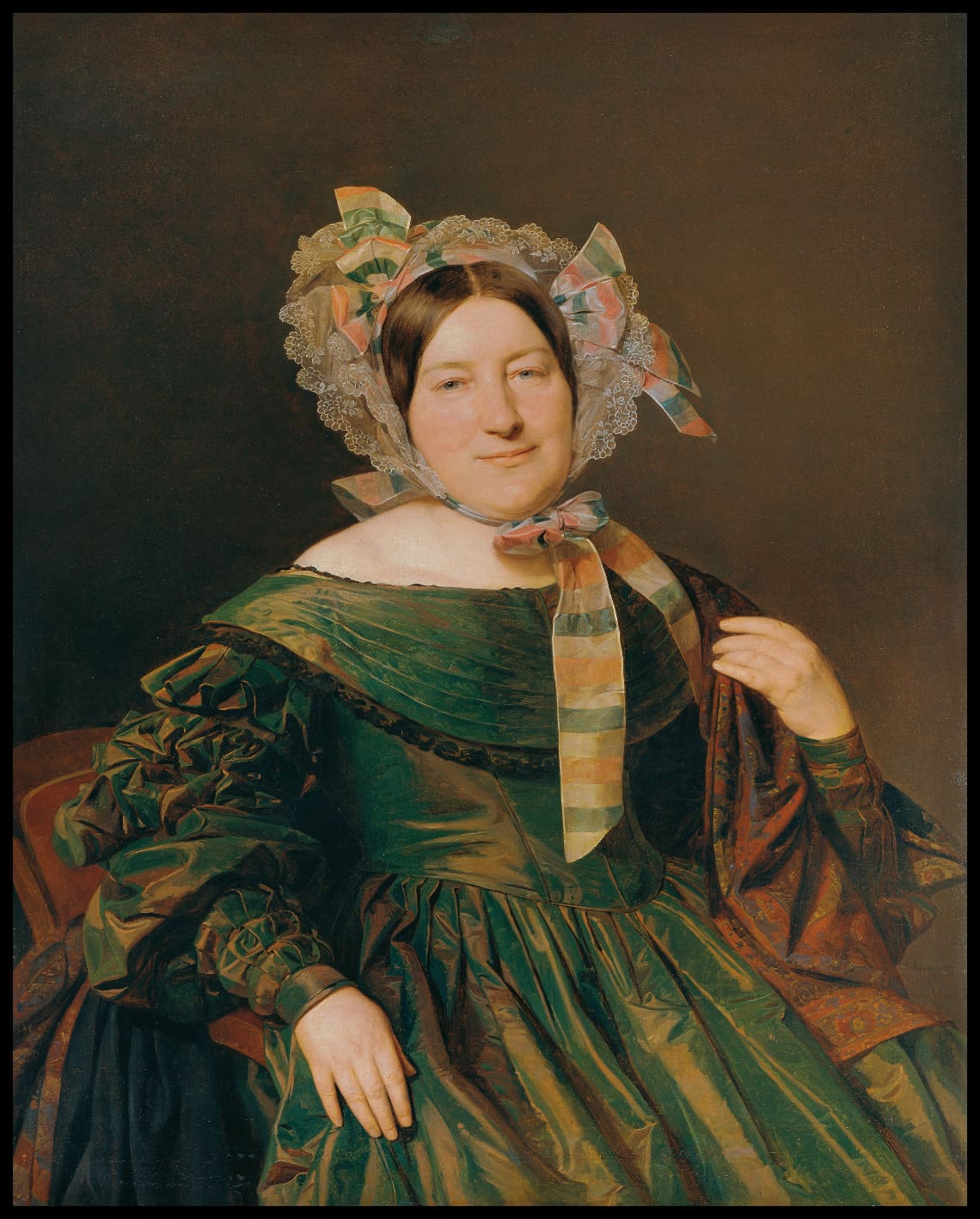 Woman in green, salmon red iridescent dress