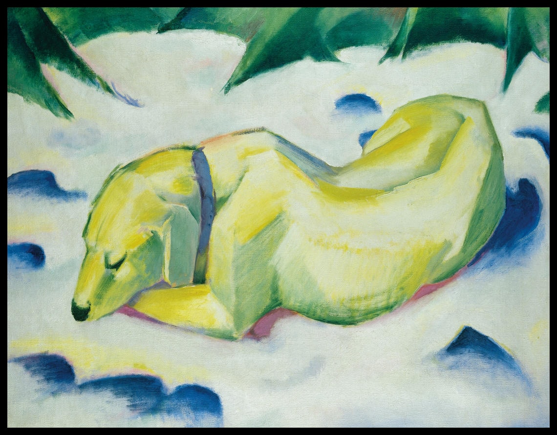 Lying dog in the snow