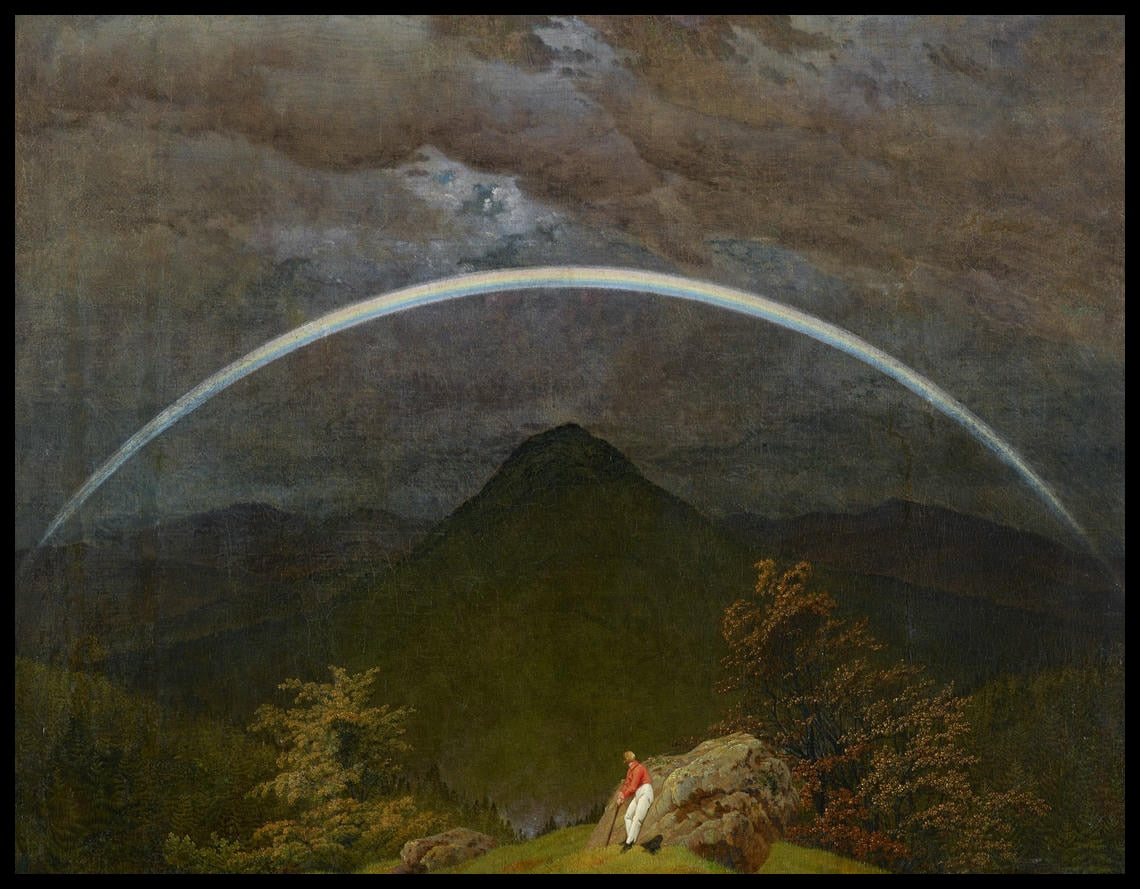 Ein Kunstdruck von einer düsteren Berglandschaft mit einem Regenbogen