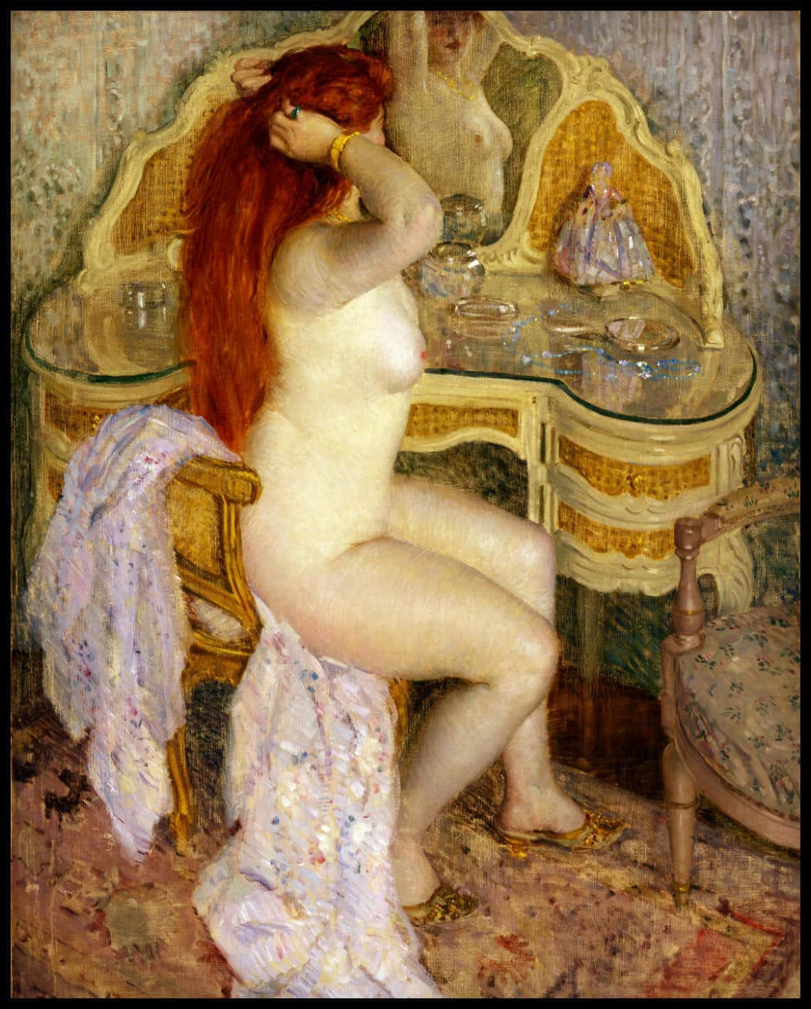 Nude seated at her dressing table