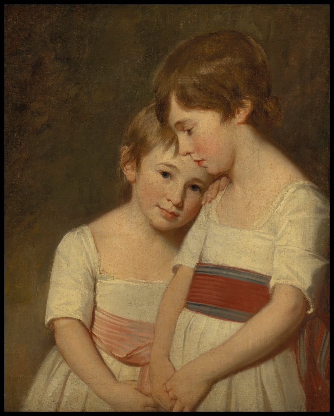 Double portrait of two siblings in white dresses