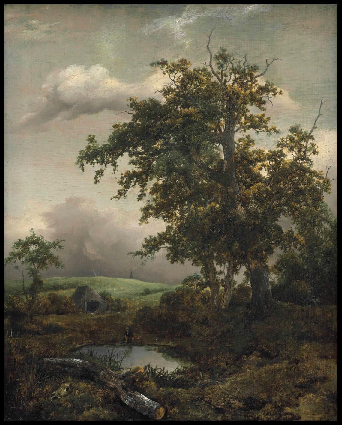 A wooded landscape with a man at rest by a pond near a hut