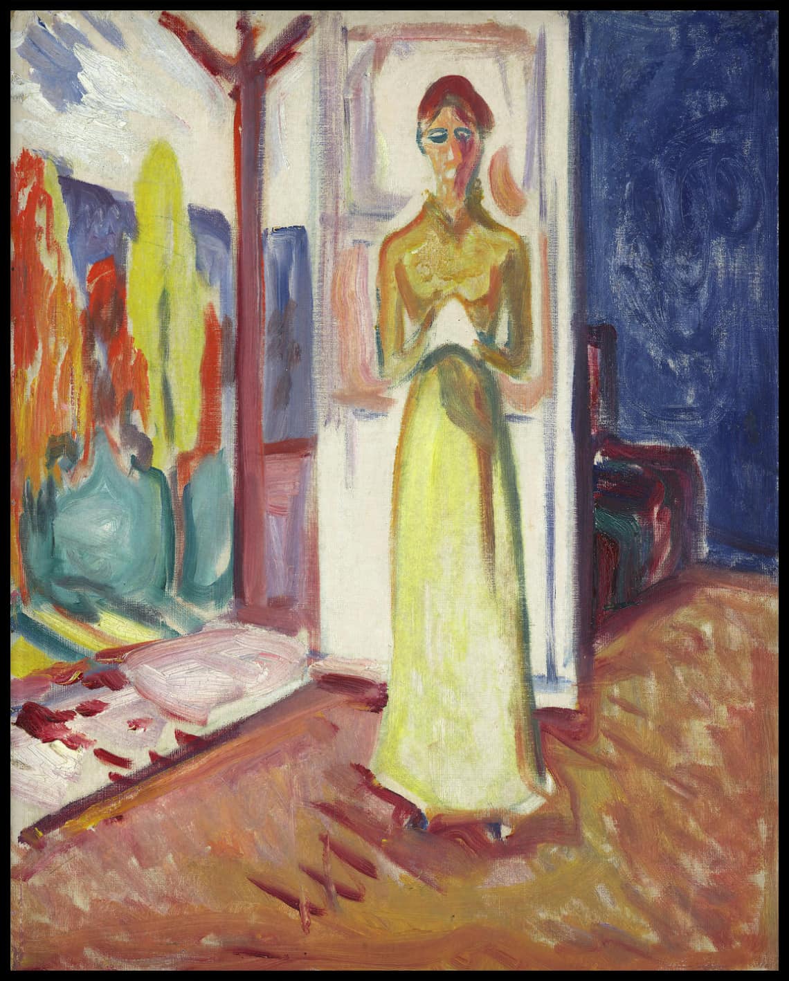 Femme debout dans la porte