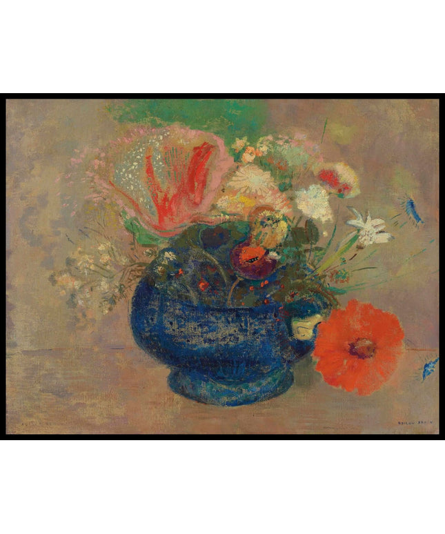 Fleurs dans une coupe bleue