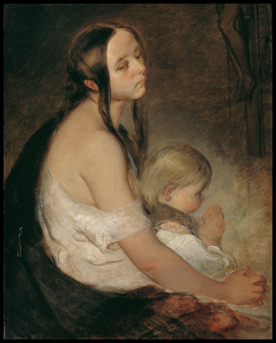 Mother with child under the crucifix