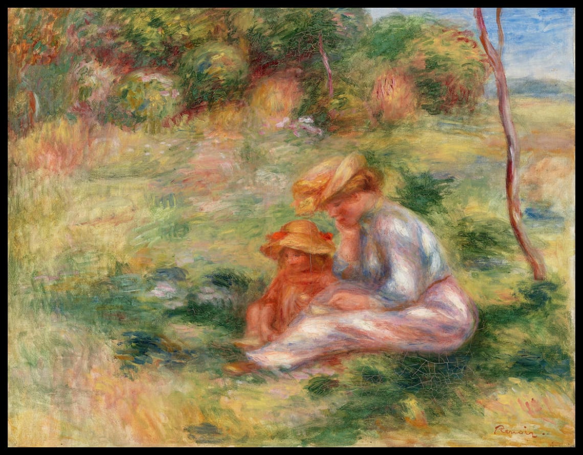 Femme et enfant dans l'herbe