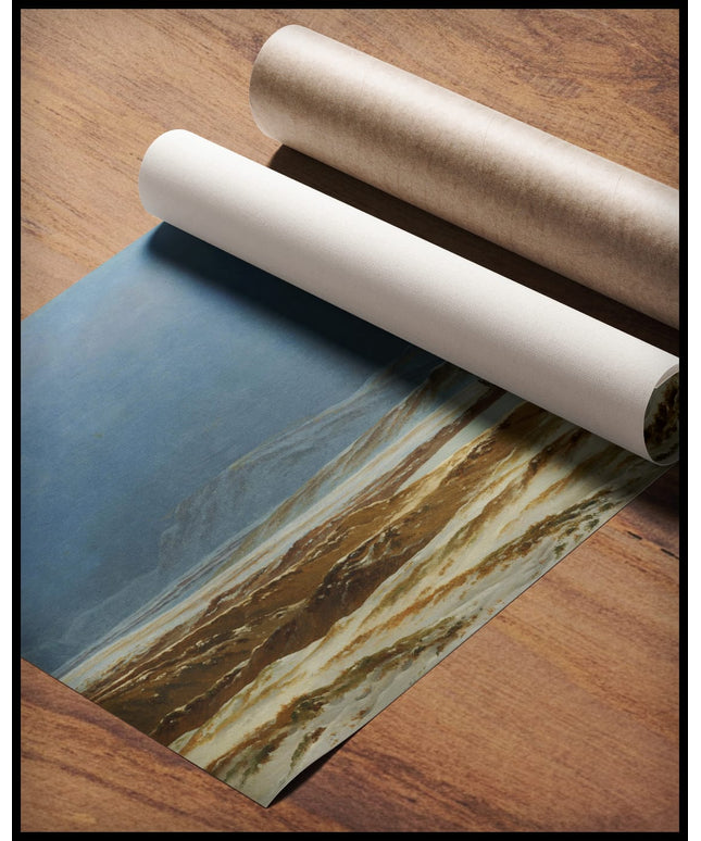 Ein Kunstdruck von einer schneebedeckten Landschaft mit vereisten und verschneiten Wasserflächen, gerollt auf einer Holzoberfläche liegend