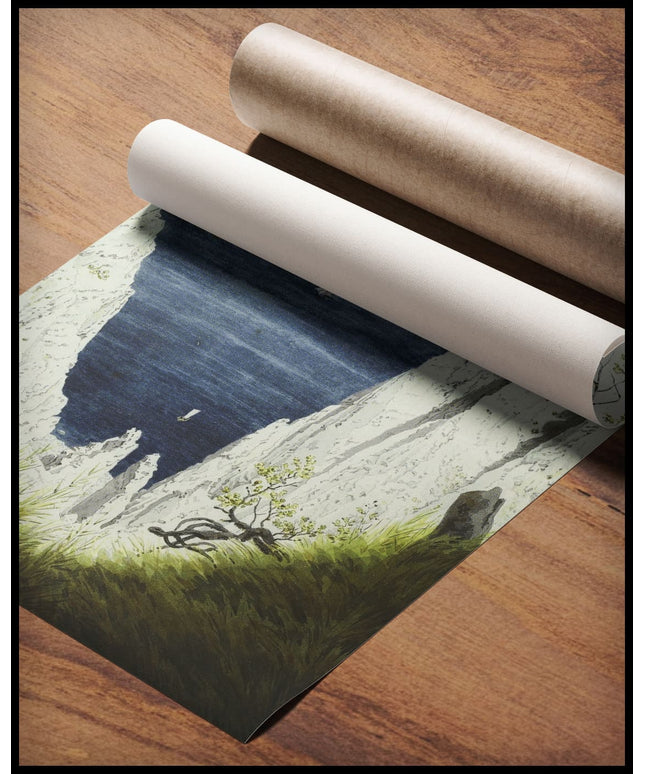 Ein Kunstdruck mit einer Darstellung der Kreidefelsen auf Rügen, gerollt auf einem Holztisch liegend