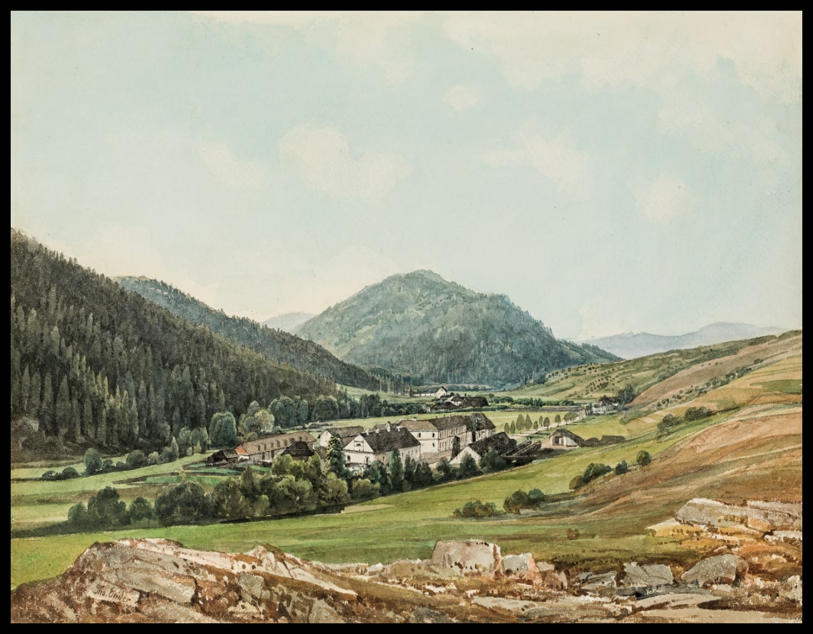 Bauernhof in hügeliger Landschaft