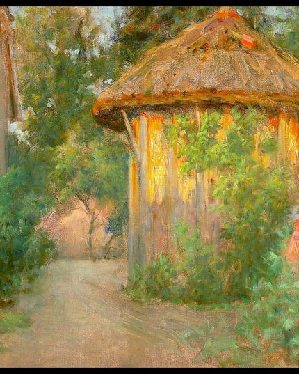 Skagenshus with thatched pavilion in the evening sun