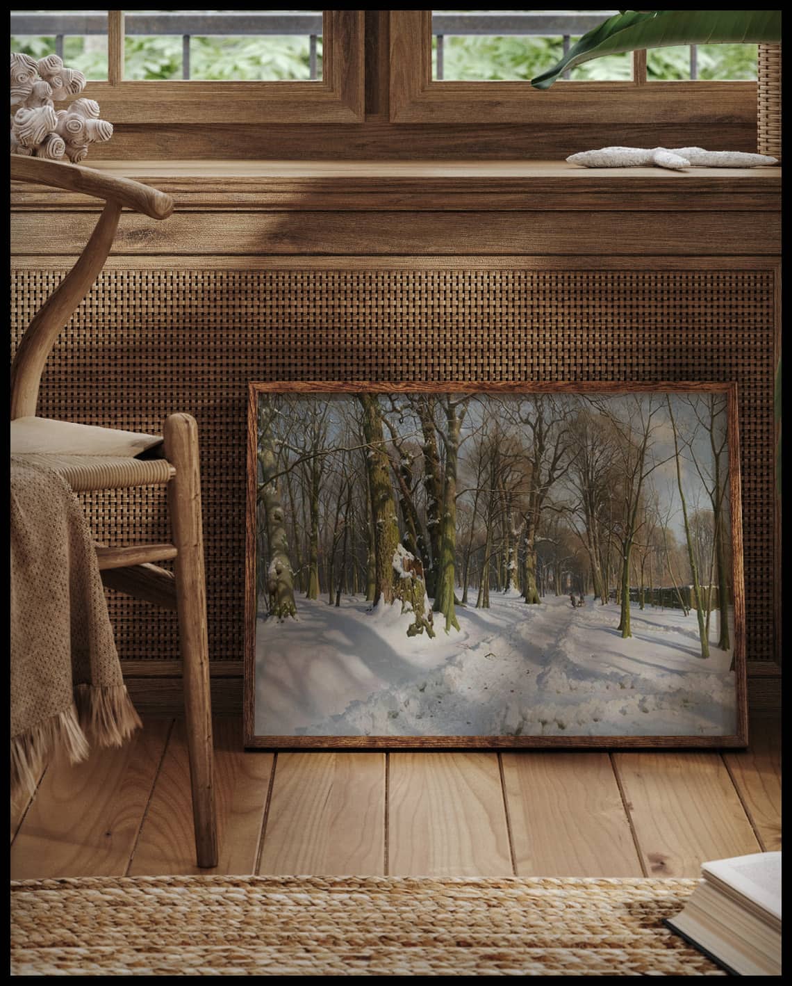 Snow-covered forest path in the sunlight